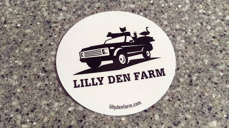 Photo of round Lilly Den Farm bumper stickers